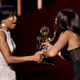 Regina King accepts the Emmy for Outstanding Supporting Actress in a Limited Series or a Movie from Taraji P. Henson during the 67th Annual Primetime Emmy Awards at Microsoft Theater in Los Angeles Sept. 20, 2015.
Kevin Winter/Getty Images